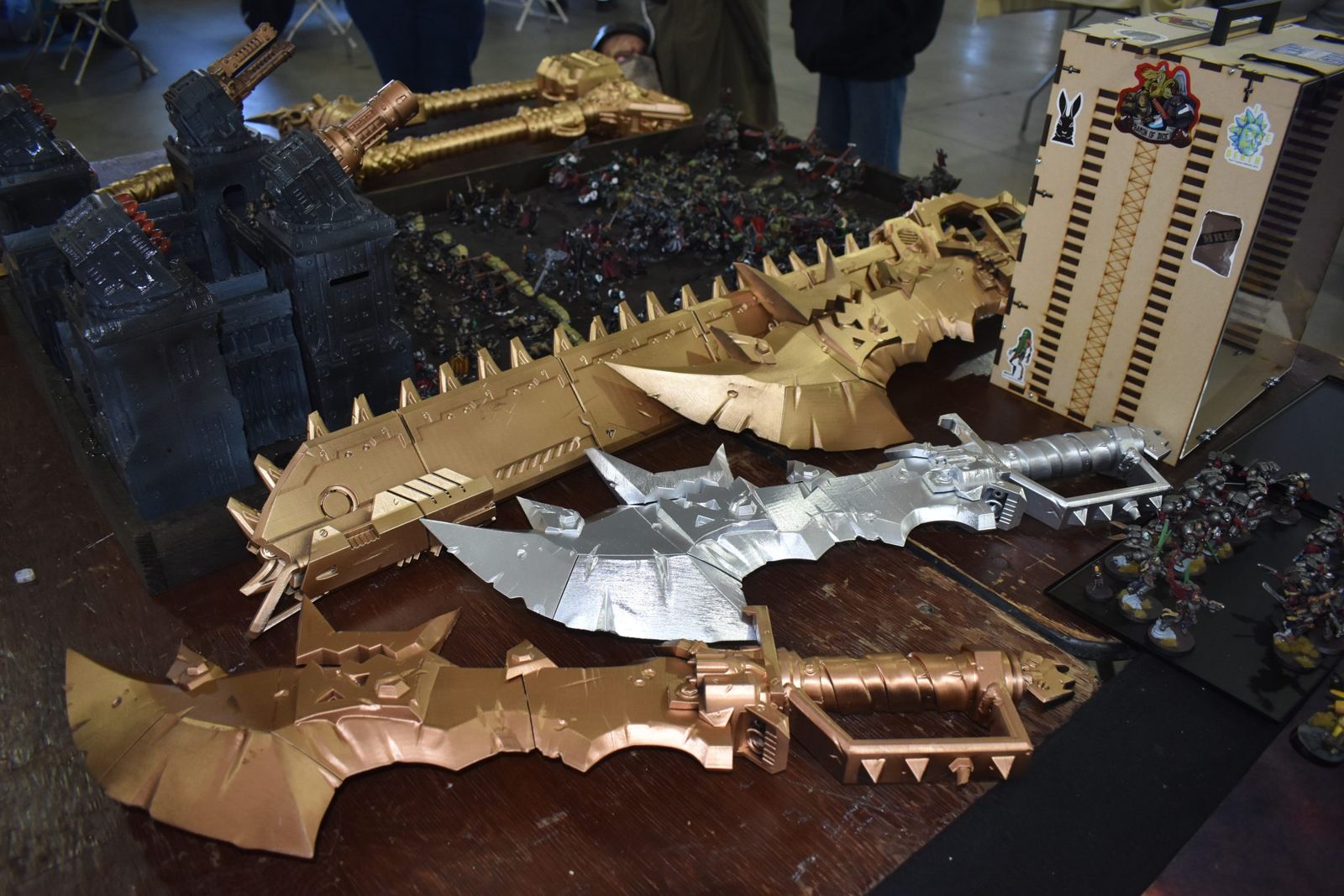 Gold and silver Ork weapon trophies for the OrktoberFest III winners